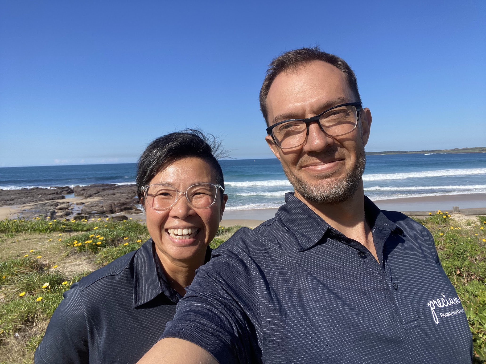 Matt Knight and Mavis from Precium on the beach after a property inspection
